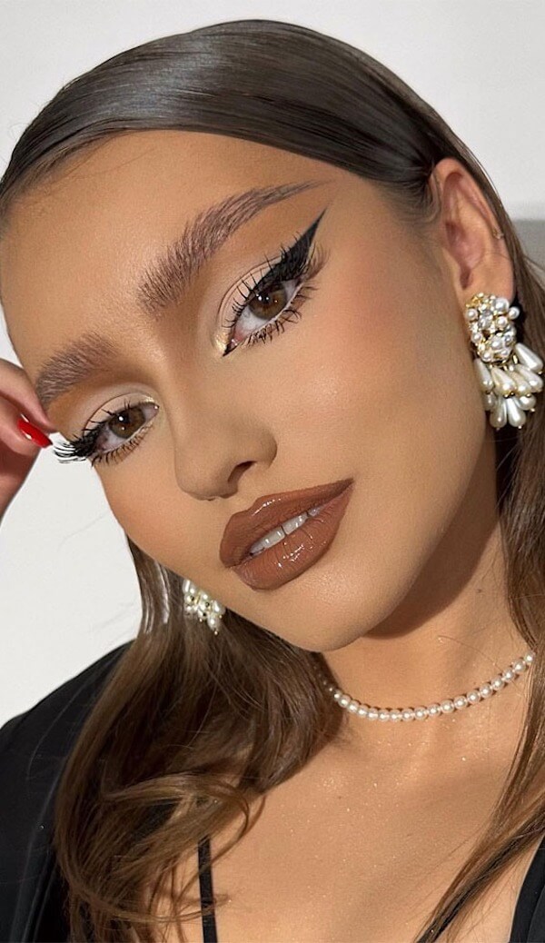 Soft Neutral Tones with Bold Liner