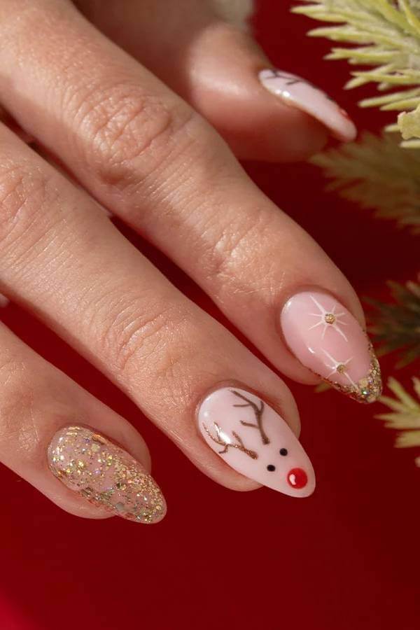 Gold Glitter and Reindeer Accent Nails