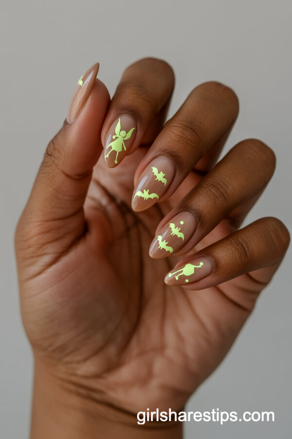 Almond nails with glow-in-the-dark Tinker Bell