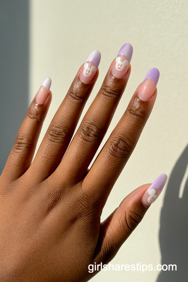 Squoval nails with translucent ghost Mickey heads