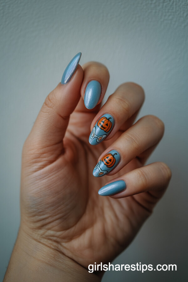 Almond nails with pumpkin coach and glass slipper
