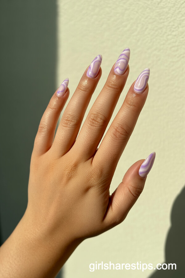 Lavender Swirl Stiletto Nails on Milky White Base