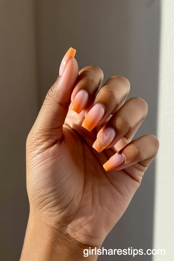 Sunset Ombre Coffin Nails with Gold Shimmer