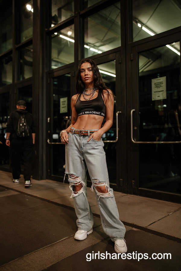 Oversized Ripped Jeans & Black Sports Bra