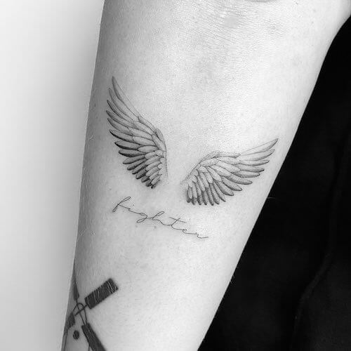 black wings tattoo meaning and designs