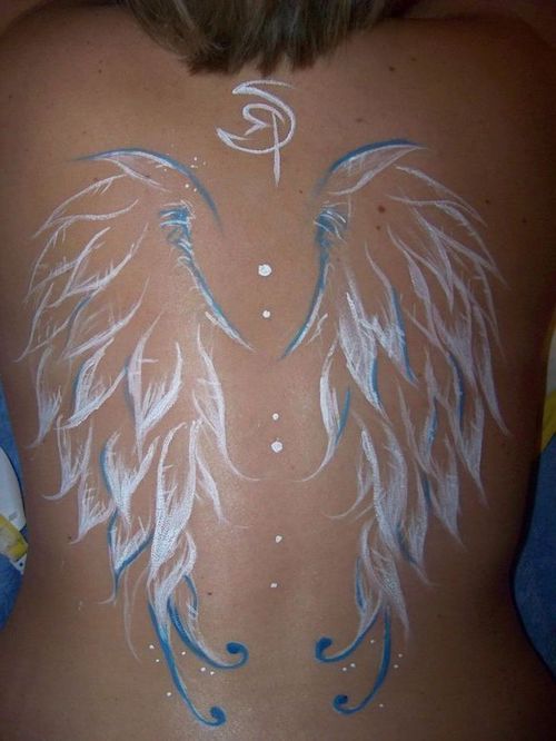 angel wing tattoo with white ink