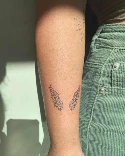 double wings tattoo meaning