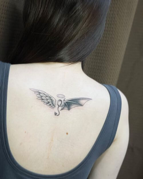 angel and devil angel wing tattoo meaning