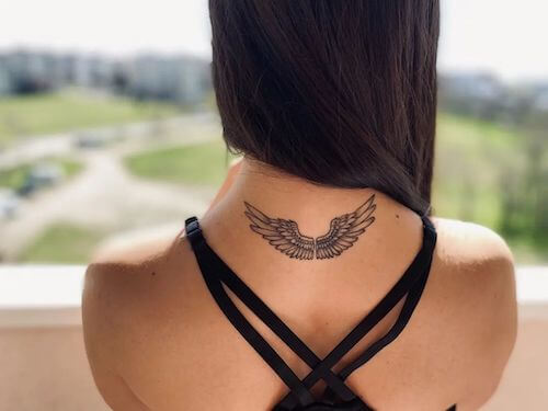 black wings tattoo meaning and designs