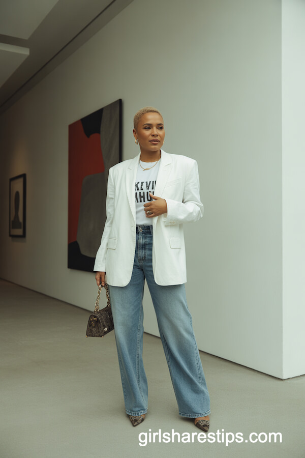 White Blacer and Graphic Tee with Medium-Wash Baggy Jeans