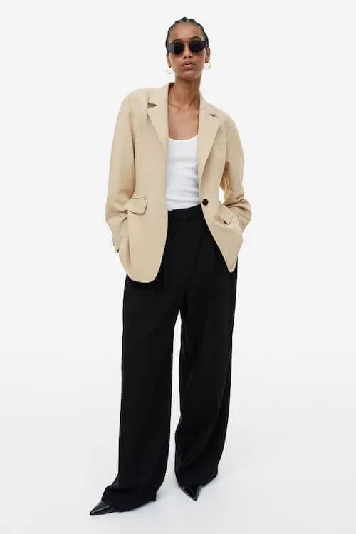 beige blazer and black wide leg pants