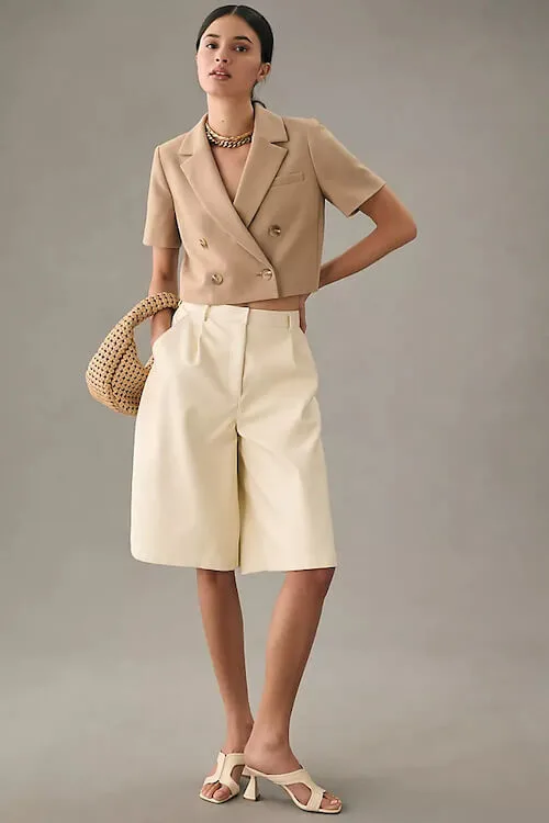 short beige blazer and long shorts