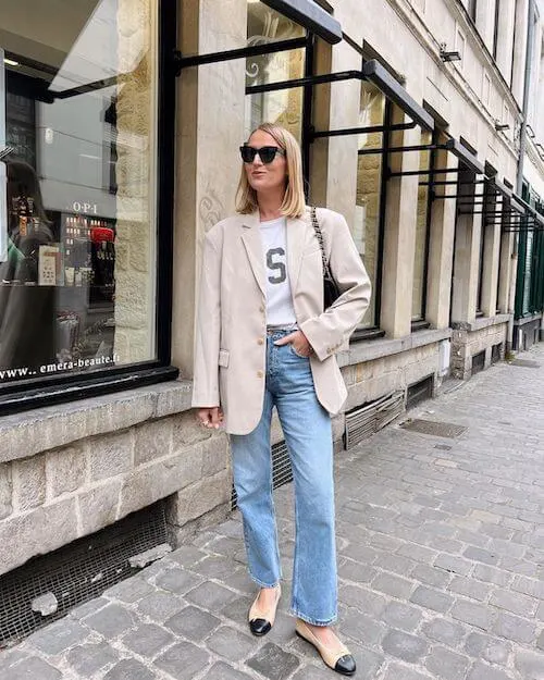 beige blazer, white tee, and jeans