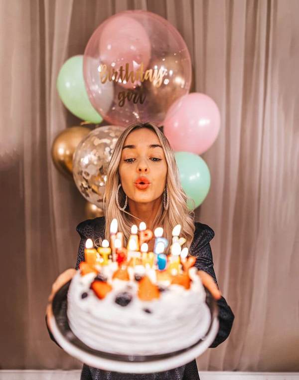 Beautiful Woman Celebrating a Birthday Party Having Fun Laughing and Eating  Cakes Under Flying Confetti. Girl Posing and Smiling Stock Image - Image of  enjoyment, confetti: 132731143