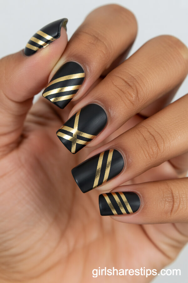 Matte Black Square Nails with Shiny Gold Geometric Striping Tape