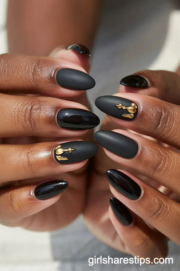 Oval Nails with Glossy and Matte Black, Accented by Gold Details