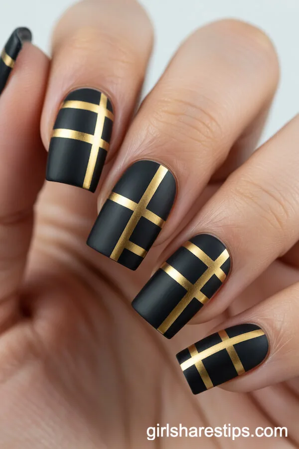 Square Nails with Matte Black Base and Gold Grid Stripes