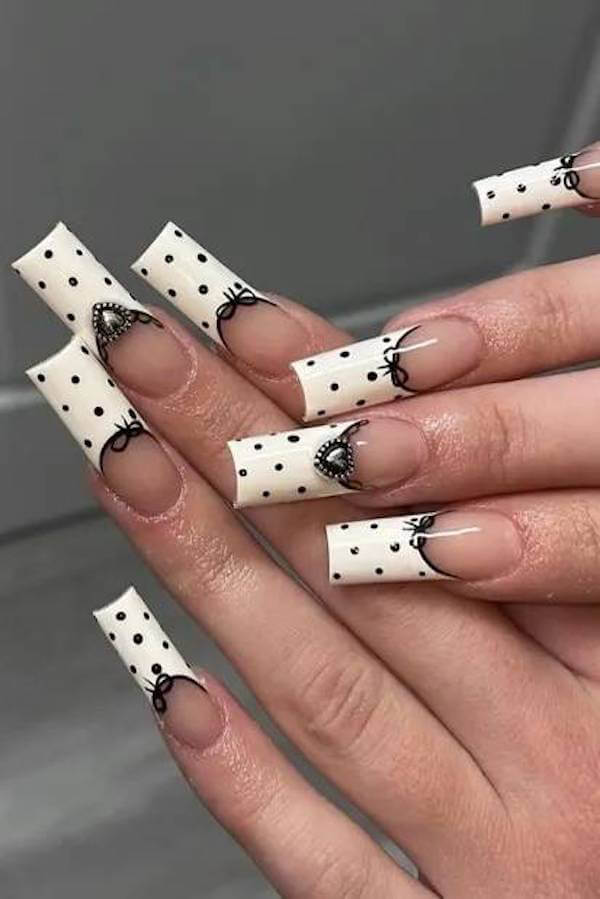 Elegant Polka Dot Nails with Bow Accents