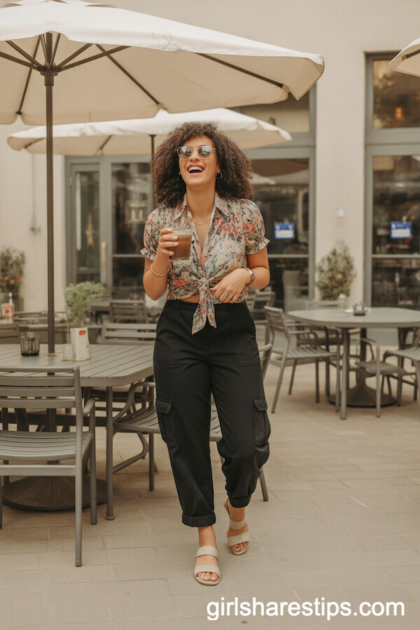 Floral Blouse Tucked into Black Cargo Pants for a Brunch Vibe