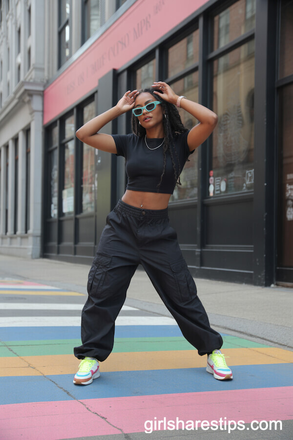 Trendy Crop Top and Neon Sneakers with Black Cargo Pants