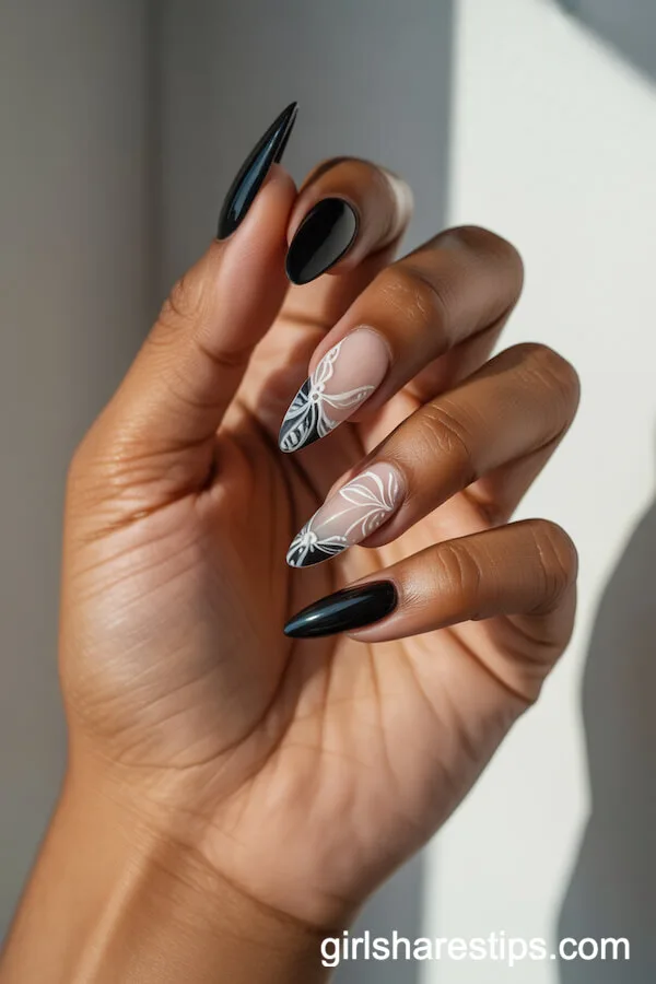 Stiletto Nails with Black Polish and White Lace Floral Overlay