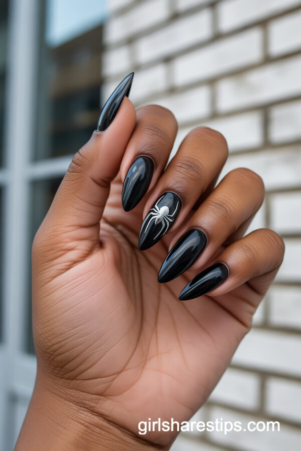 Glossy Black Stiletto Nails with Silver Spider