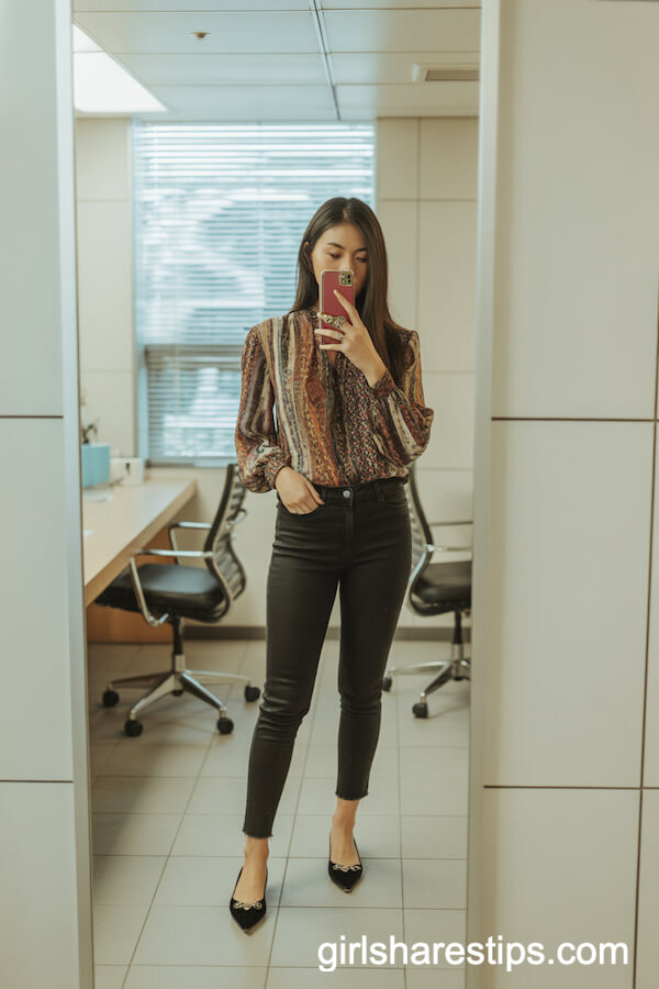 Black Skinny Jeans with a Colorful Patterned Blouse