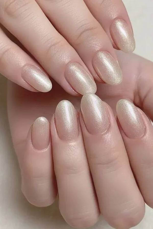 Champagne Shimmer Almond Nails