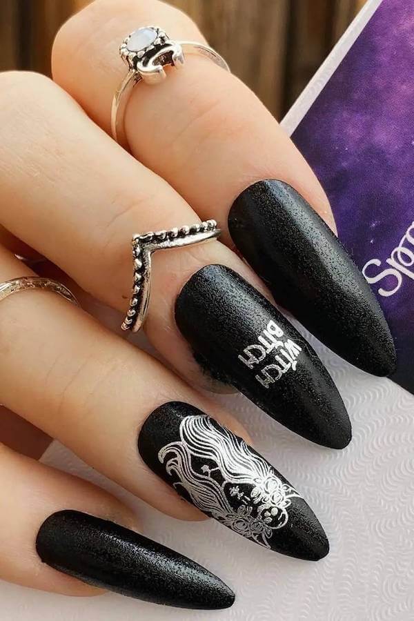 Black Witchy Stiletto Nails with Silver Art