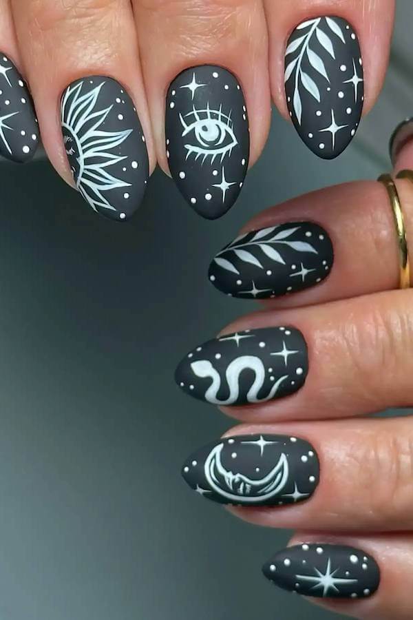 Black Celestial and Botanical Nail Art