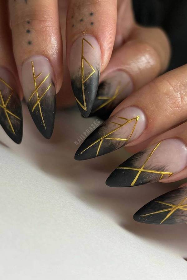 Black Ombre Nails with Gold Rune Accents
