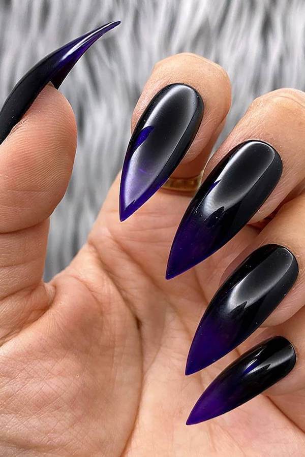 Glossy Black and Purple Stiletto Nails