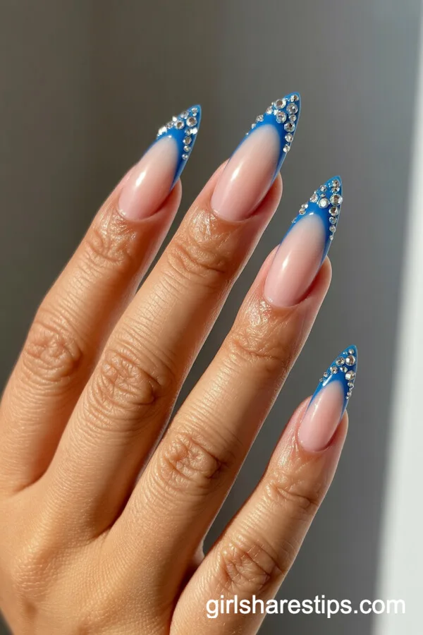 Crystal-Encrusted Blue Gradient French Tip Stiletto Nails