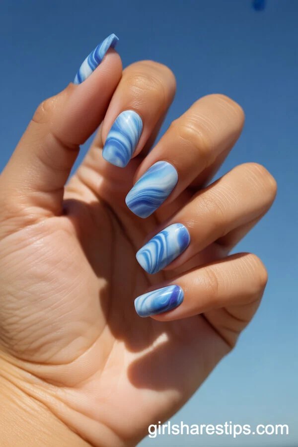 Round Nails with Blue and White Swirling Beach Tie Dye