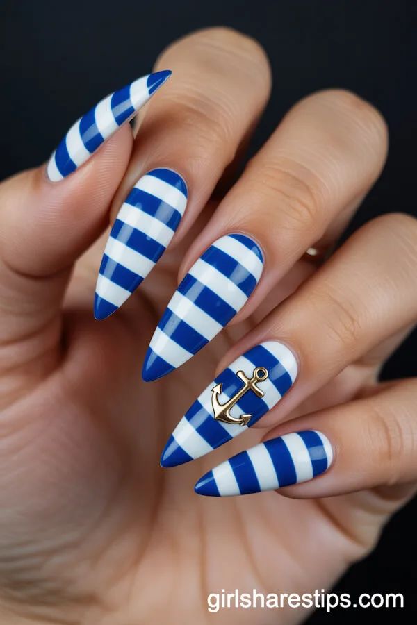 Stiletto Nails with Blue and White Nautical Stripes and Gold Anchor