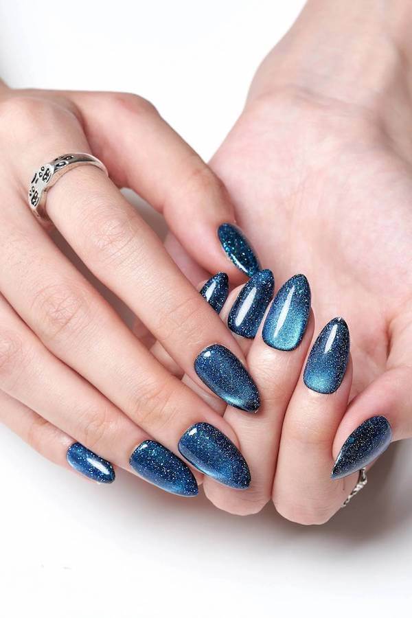 Blue Sparkle Cat Eye Nails with Extra Glitter