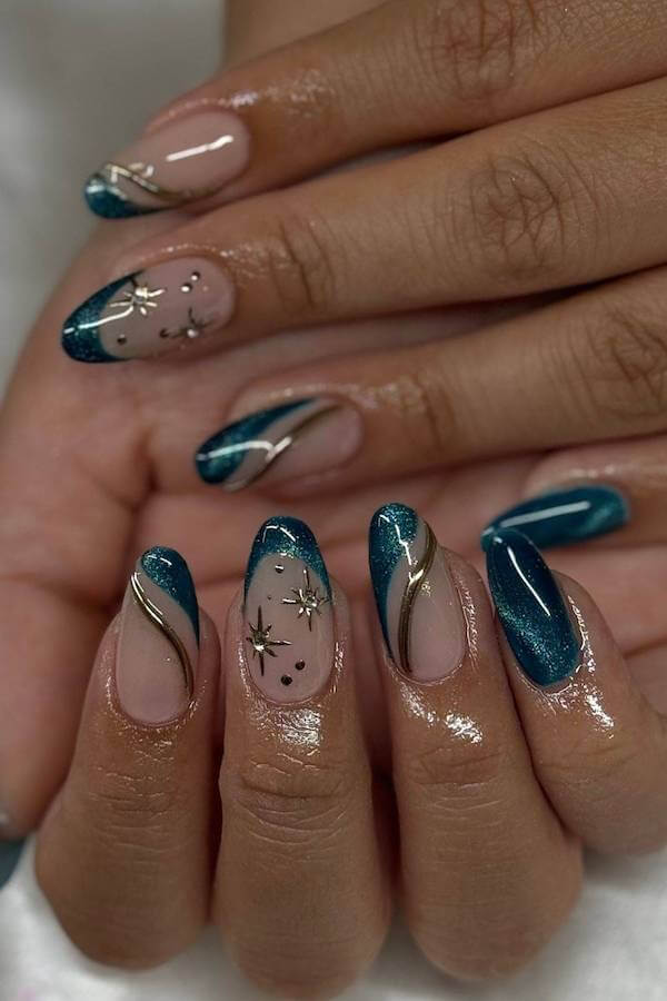 Blue Cat Eye Nails with Gold Star Accents