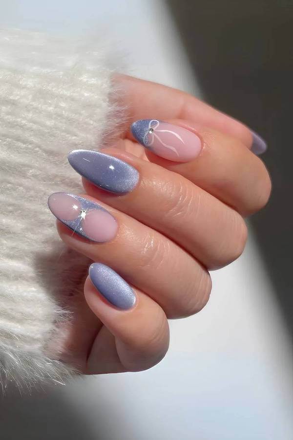 Pastel Blue Cat Eye Nails with Subtle Bow