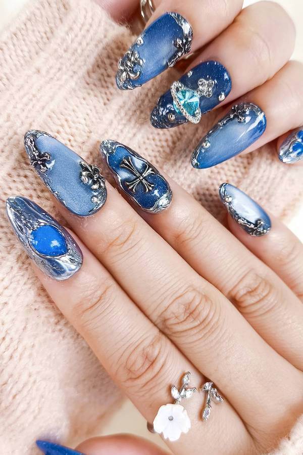 Blue Cat Eye Nails with Metallic 3D Embellishments