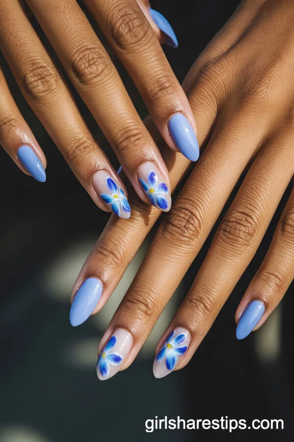 Sheer Blue Almond Nails with Blue and Violet Orchid Details