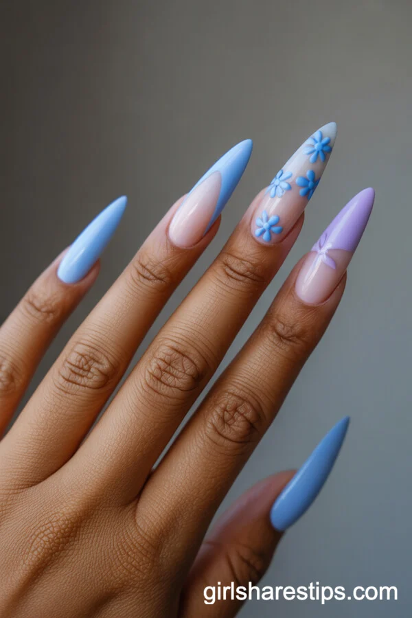 Stiletto Baby Blue Nails with Gradient Lavender and Tiny Blue Blossoms