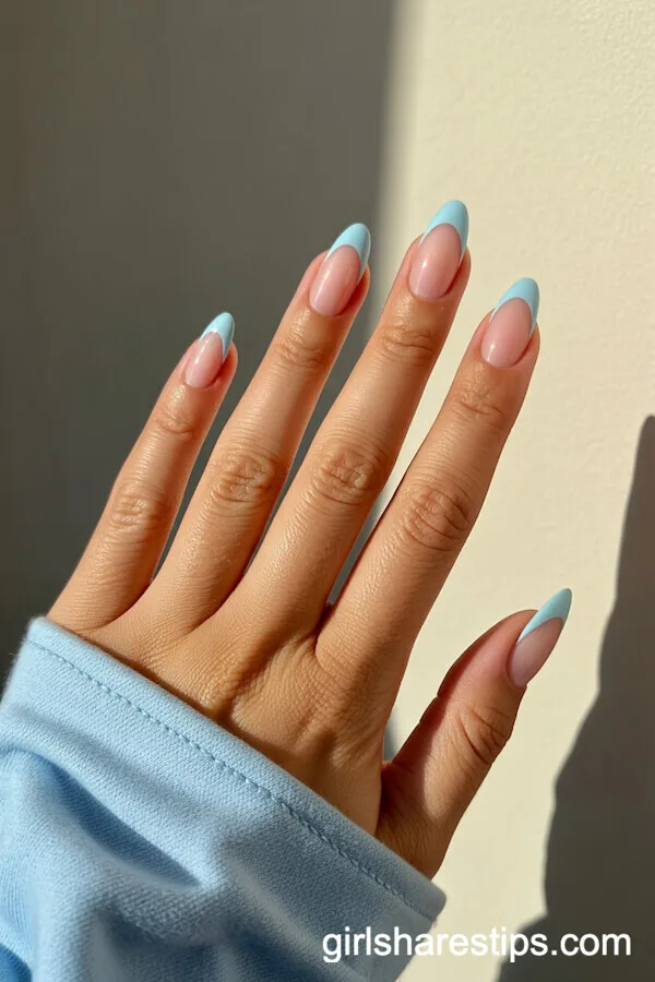 Pastel Blue French Tip Almond Nails