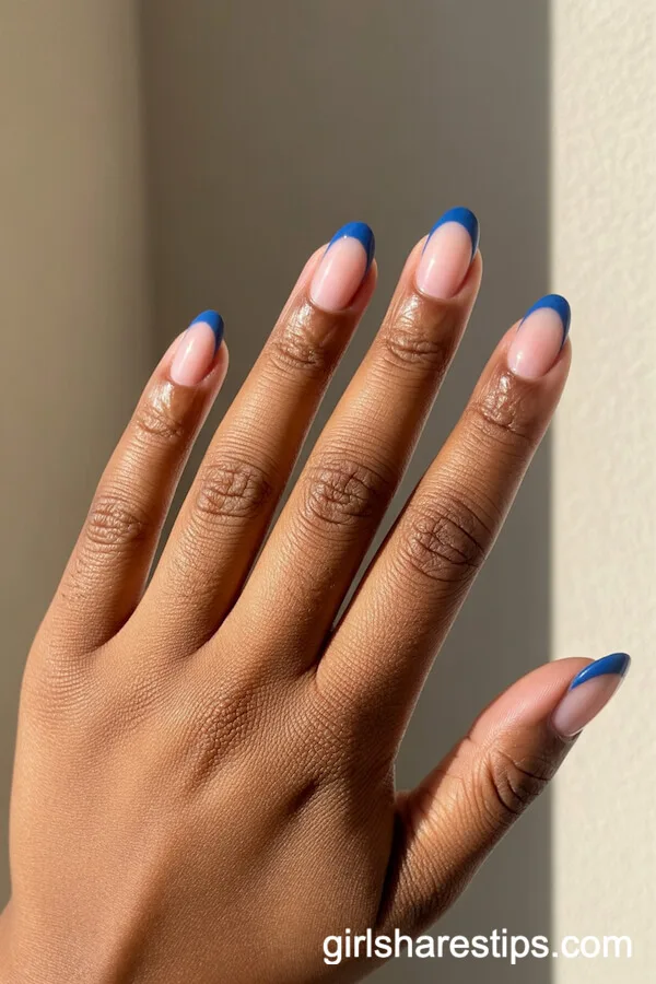 Nude Oval Nails with Classic Blue French Tips