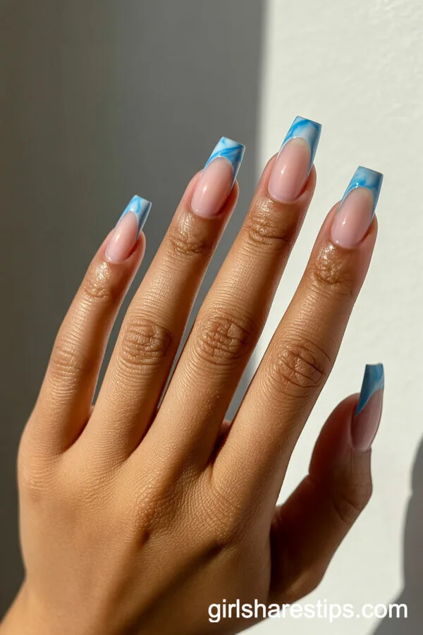 Coffin Nails with Blue Marble Tips on Nude Base