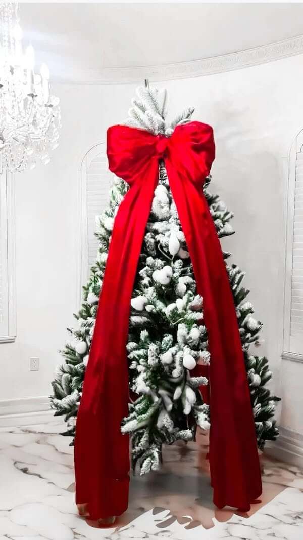 Flocked Christmas Tree with Classic Red Bow