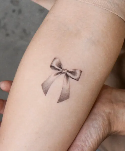 bow tattoo meaning and designs