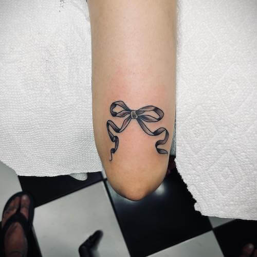 bow tattoo meaning and designs