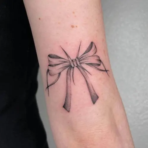 bow tattoo meaning and designs