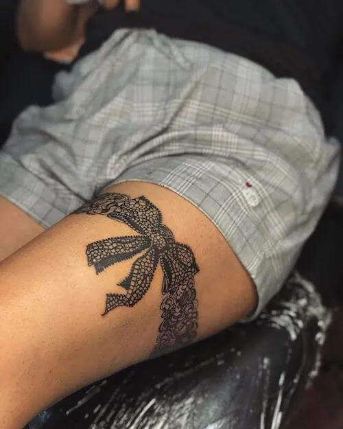 black lace bow tattoo