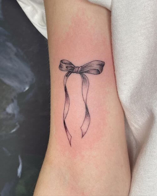 bow tattoo meaning and designs